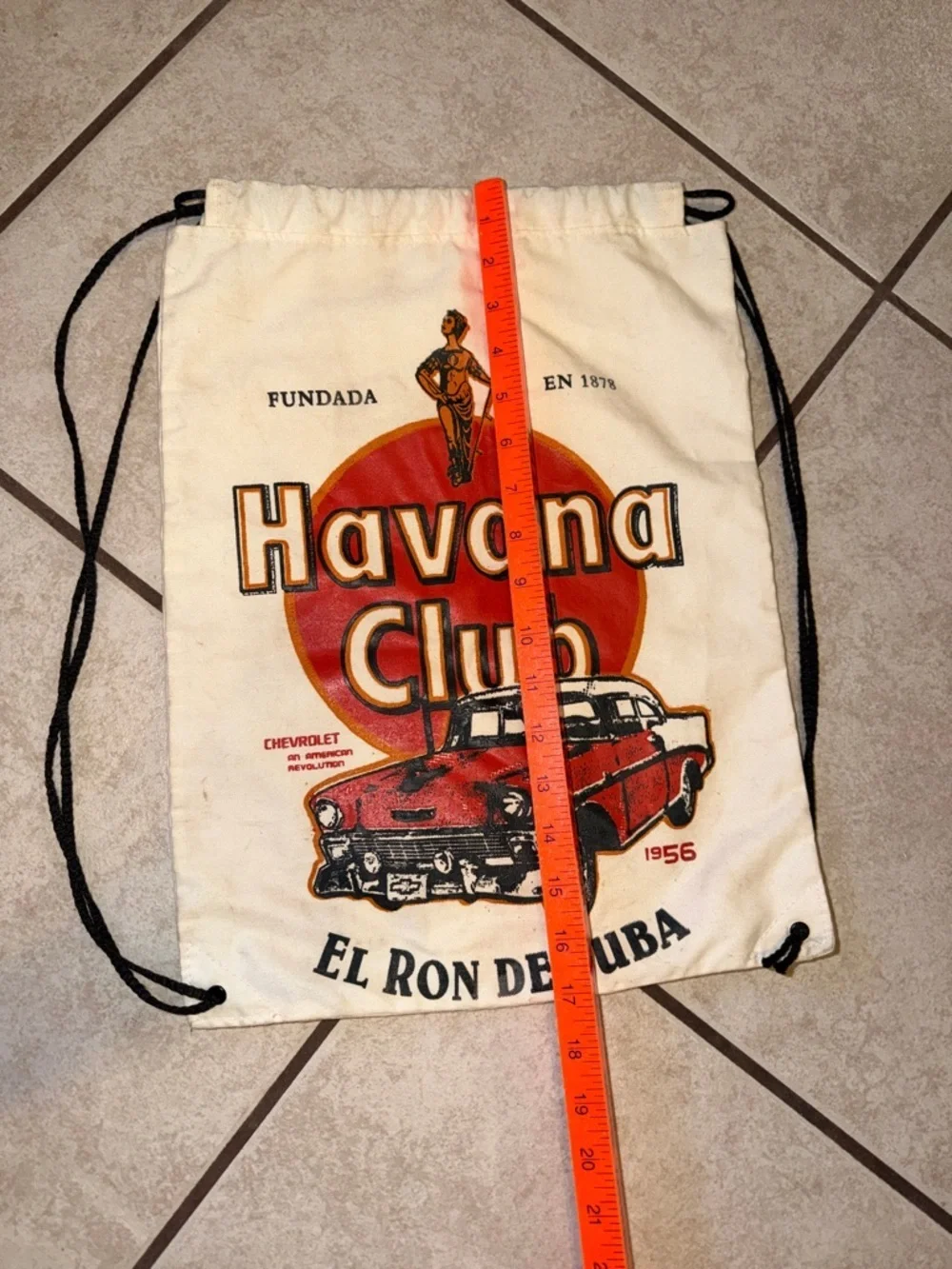 Cream Drawstring Backpack with Red Graphic